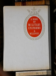 A BOOK OF MILITARY UNIFORMS & WEAPONS